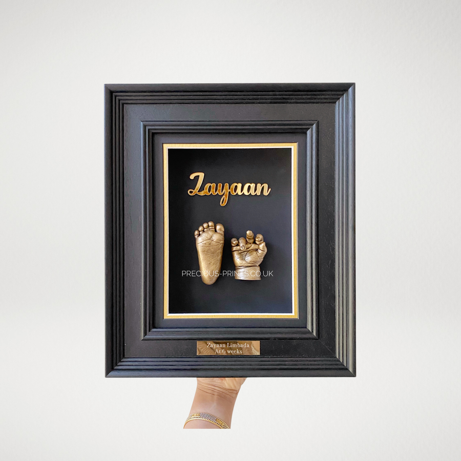 Black Premium Frame ft. brass-finished casts & gold acrylic lettering