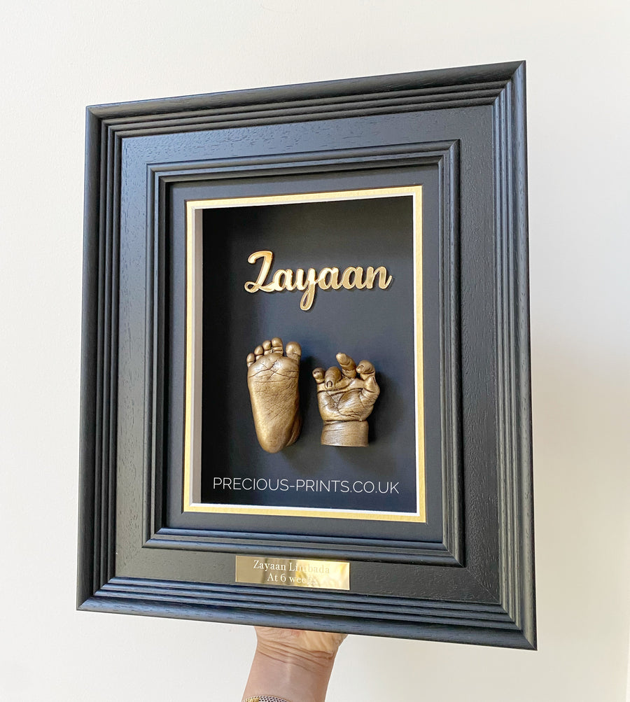 Black Premium Frame ft. brass-finished casts & gold acrylic lettering